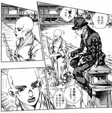 Kira talking with the monk