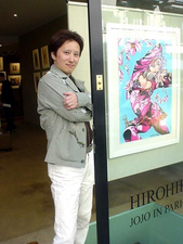 Araki next to an illustration of Giorno Giovanna