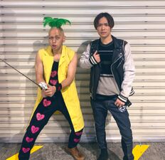Kensho Ono posing with Pesci cosplayer