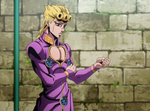 Giorno holding his arm