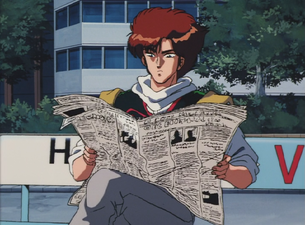 Ikuro reading a newspaper