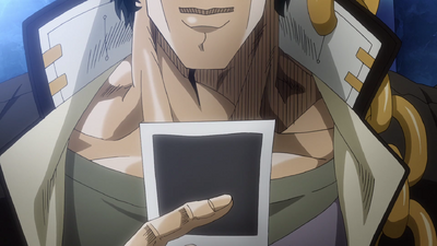 Giving a fond last look at the picture of his friends and himself