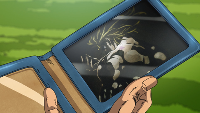 Taking out Giorno's wallet, revealing a photo of DIO