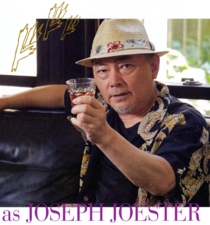 Ishizuka holding a drink