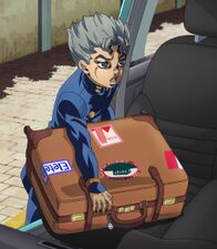 Koichi with his luggage