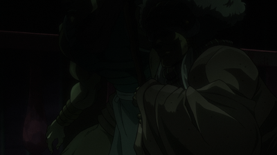 Nukesaku's initial appearance, cloaked in shadow alongside Enya