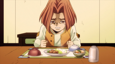 Hayato tearfully sitting at the dinner table after Kira's death, remaining strong for his mother.