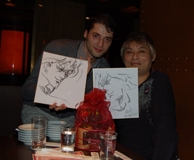 a fan and Hayama, both holding sketches (2012)[72]