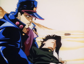 Injured Kakyoin being held by Jotaro