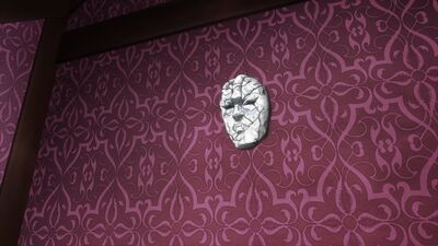The Stone Mask hanging on the wall of the Joestar Mansion