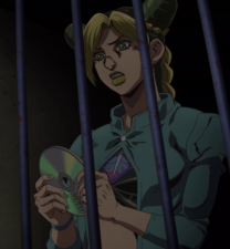 Ep 7 Jolyne holds the DISC.png