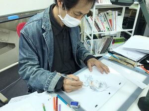Nishimura drawing a key frame