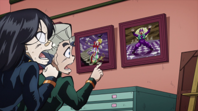 Admiring Rohan's artwork with Koichi.