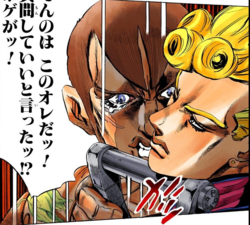 Luca become angry, using his shovel to hold Giorno's chin