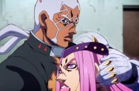 Pucci holds Anasui.jpg