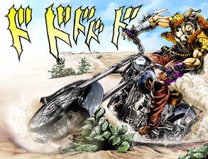 Joseph riding a motorcycle across the Mexican desert