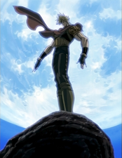 Dio standing on the top of the rock formation