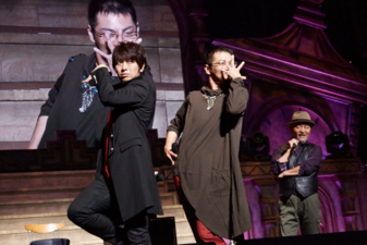 Miyake and cast posing at "The Last Crusaders" event